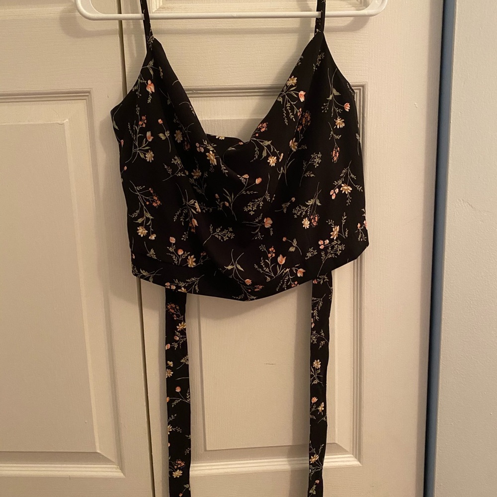 Black floral print cropped tank top.